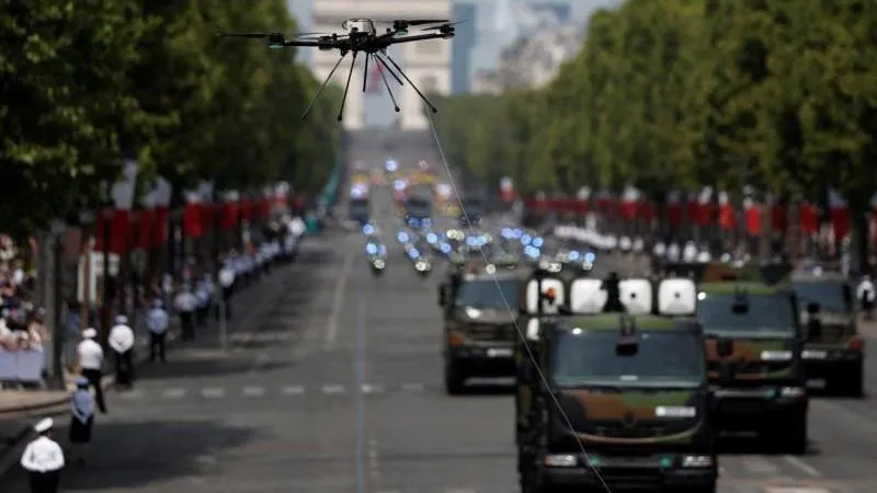 A Leclerc tank fitted with anti-drone cage and a tethered drone appeared in Paris July 14 parade