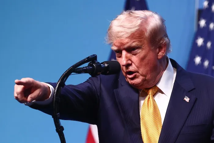 Trump declares Iran deal failed but leaves door to talks open